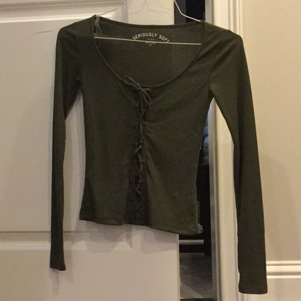 Green long sleeve shirt with ties.